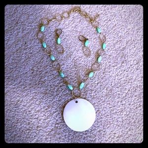 Jade gems on necklace and earrings